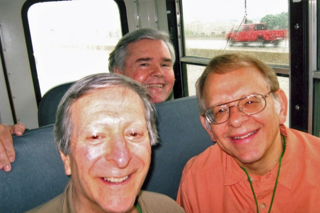 Jimmy Newman and Allen Goldberg with Mike Lyons behind them.